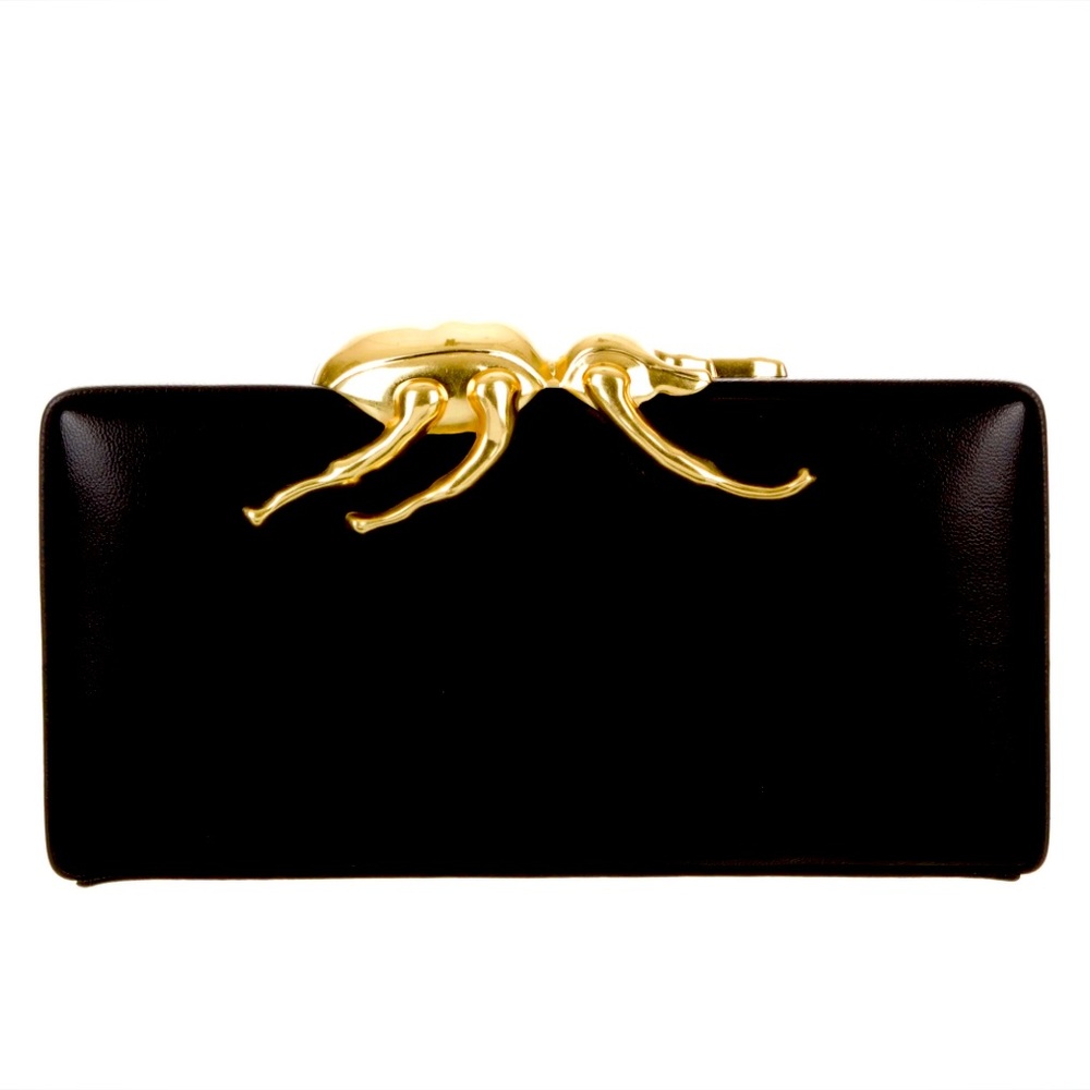Elegant black leather clutch with gold accents
